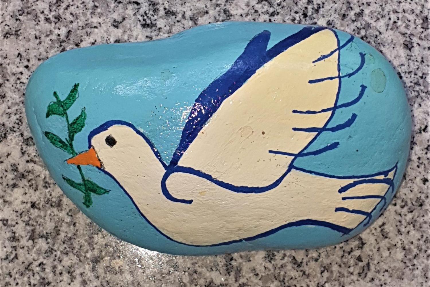 Friedenstaube auf Kieselstein