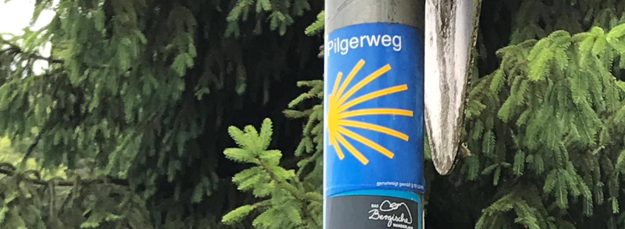Pilgerwegmarkierung am Eifgenbach