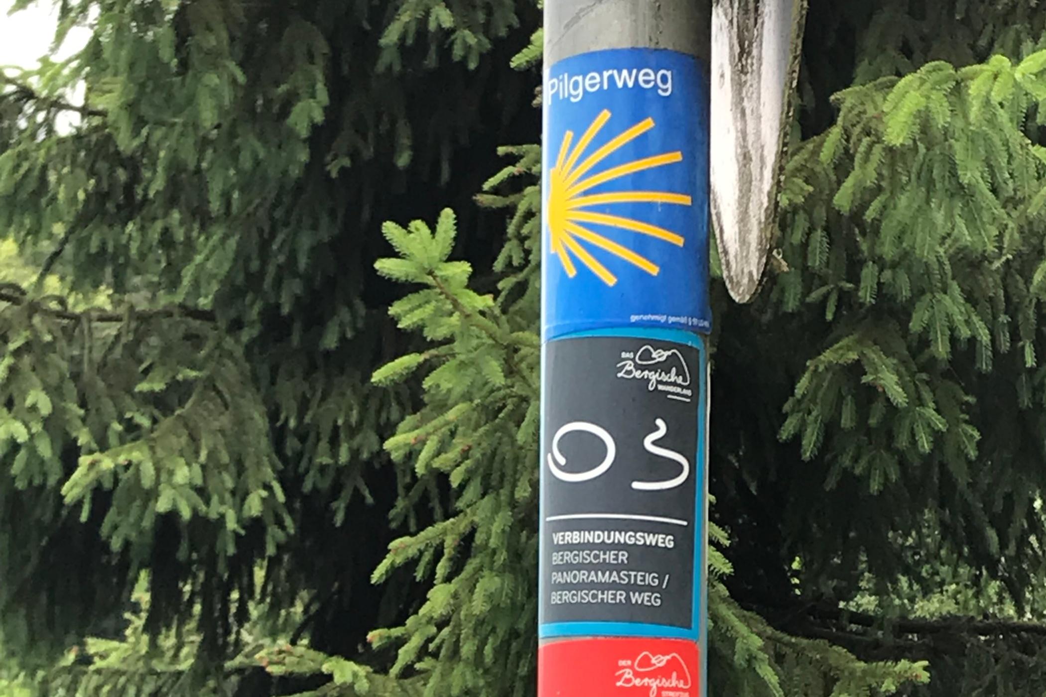 Pilgerwegmarkierung am Eifgenbach