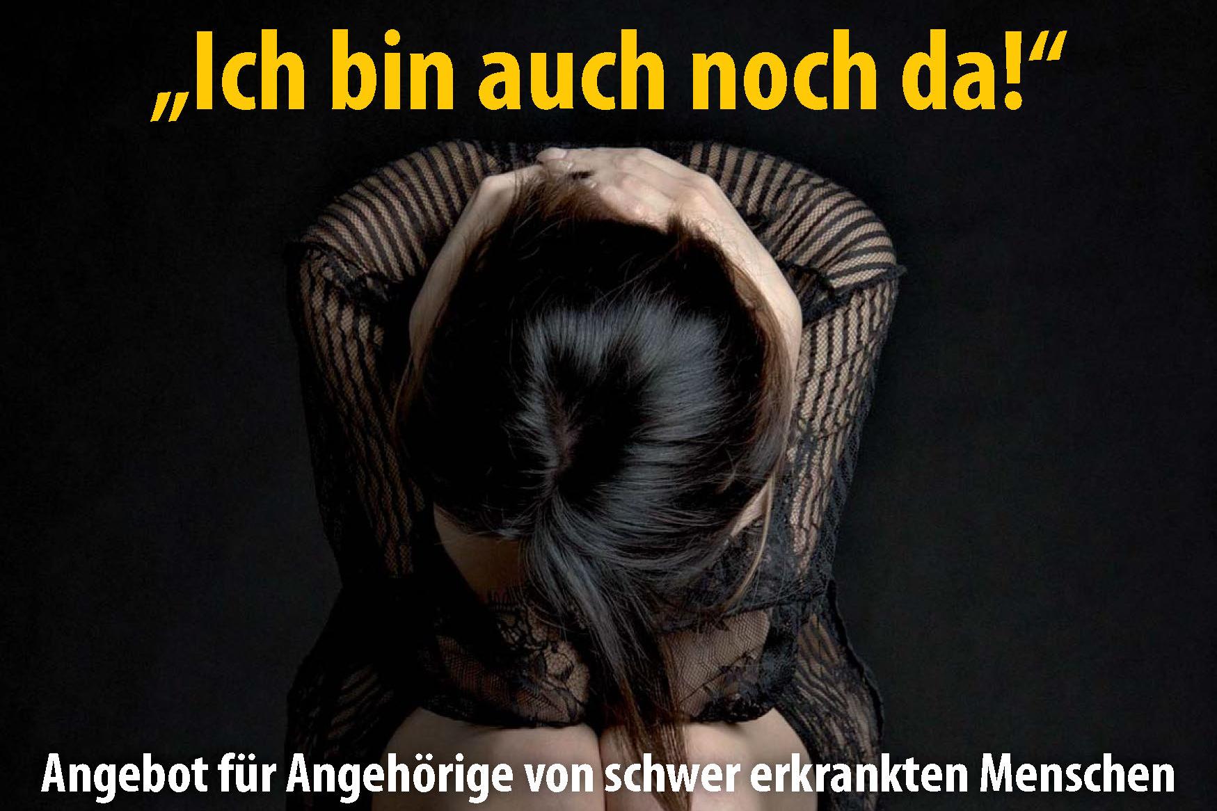 In sich zusammengesunkene Frau